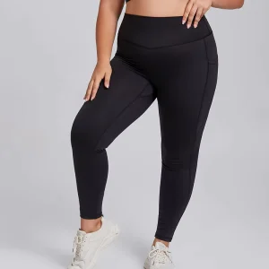 Women’s High Waisted Yoga Leggings with Pockets Tummy Control Breathable Four-Way Stretch Solid Pattern Big Size Nylon Spandex